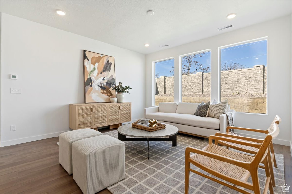 Living room featuring dark hardwood / wood-style floors