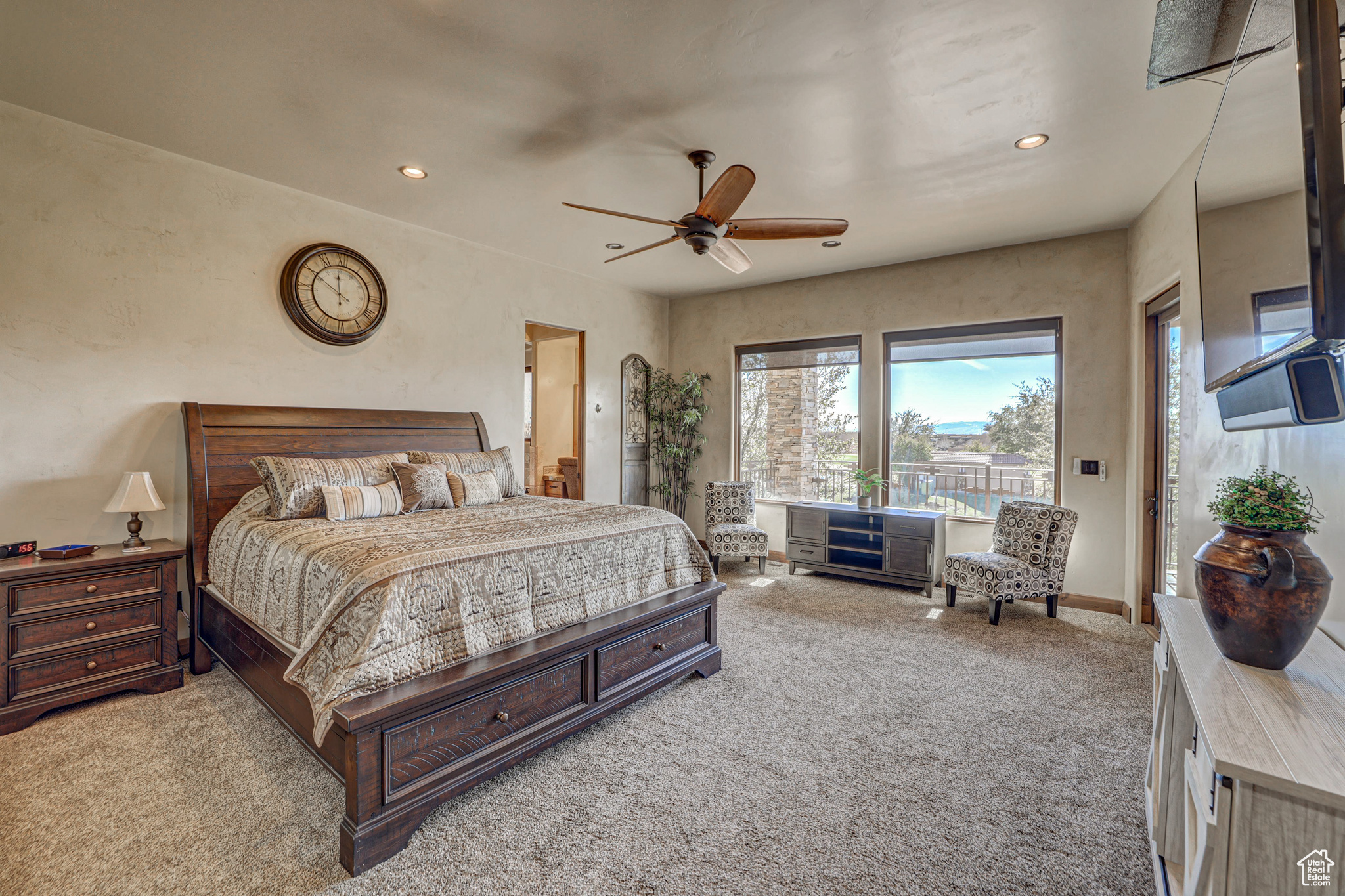 Bedroom featuring access to outside, ceiling fan, and light colored carpet