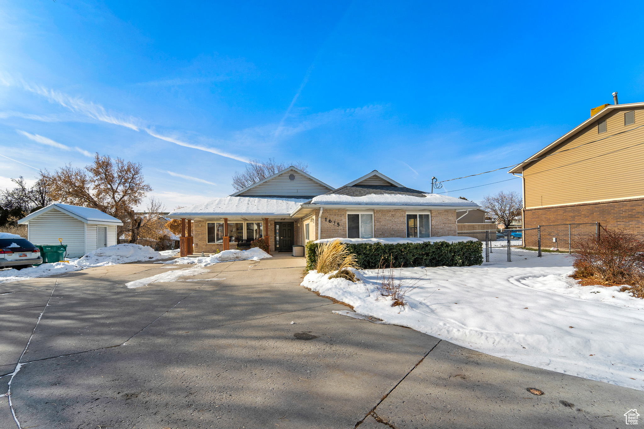 Ranch-style home featuring a garage