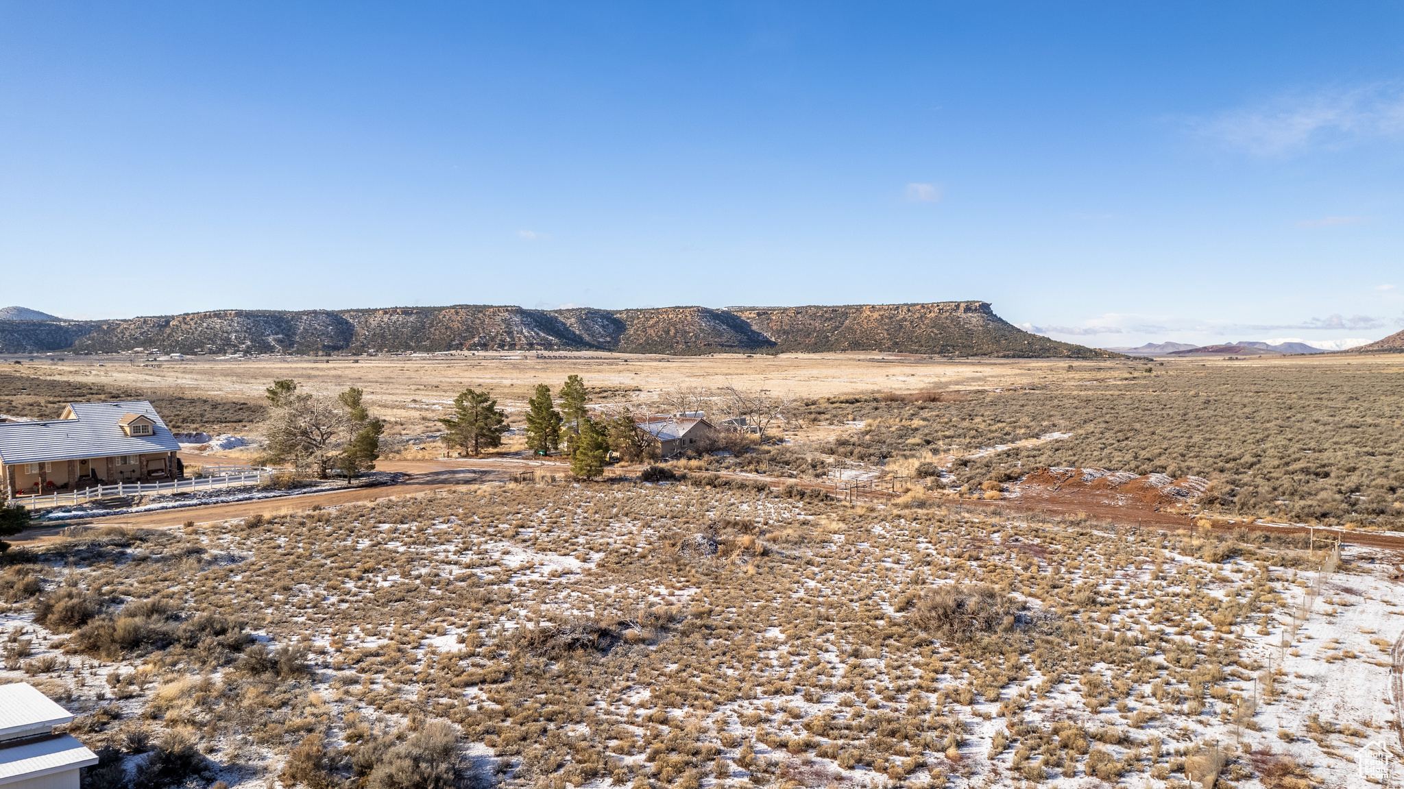 Property view of mountains with a rural view