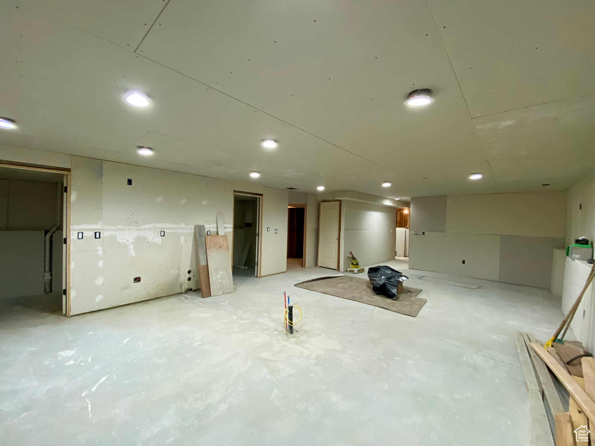 Basement living area with rough in plumbing for a kitchenette