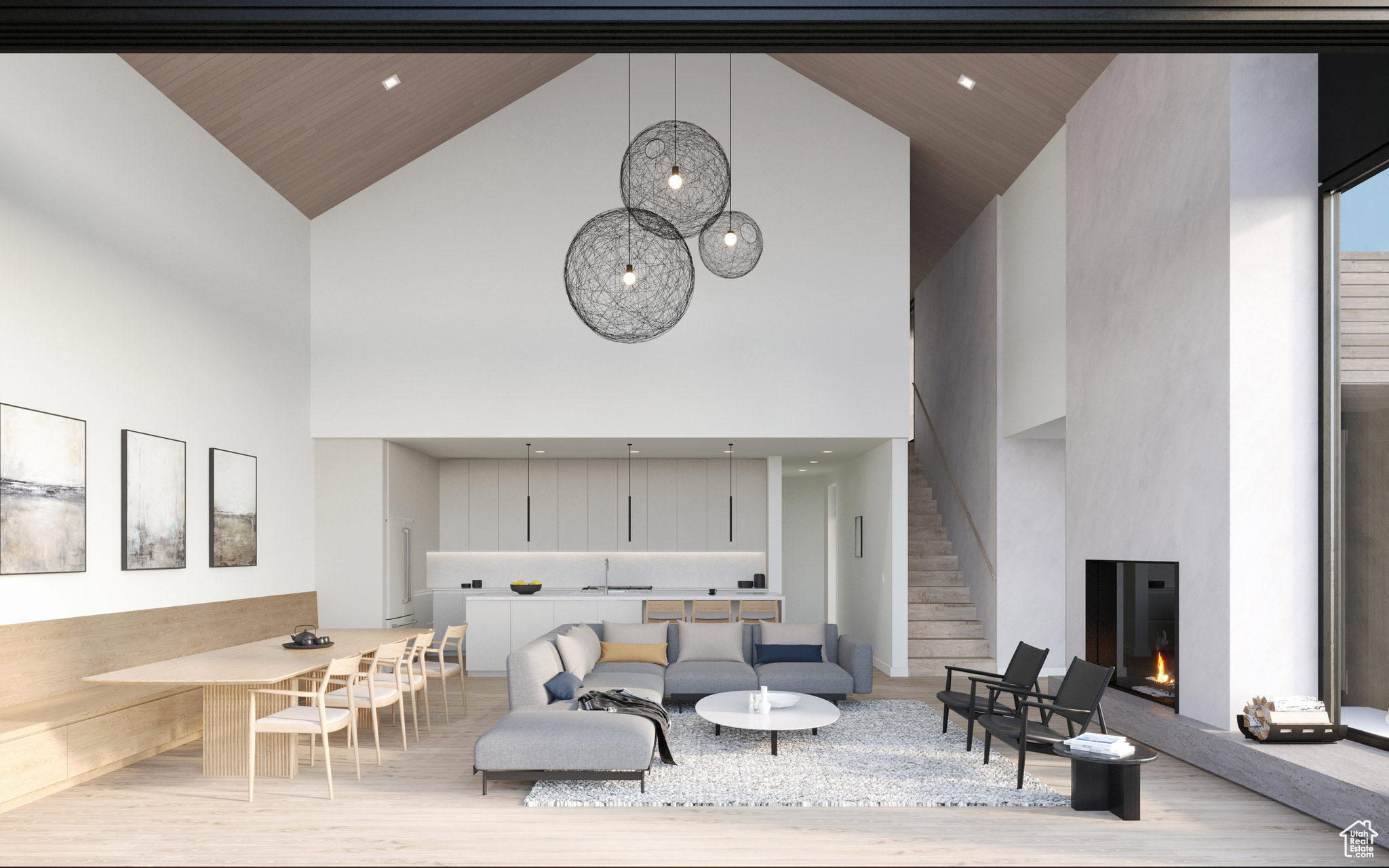 Living room with light wood-type flooring, sink, and high vaulted ceiling