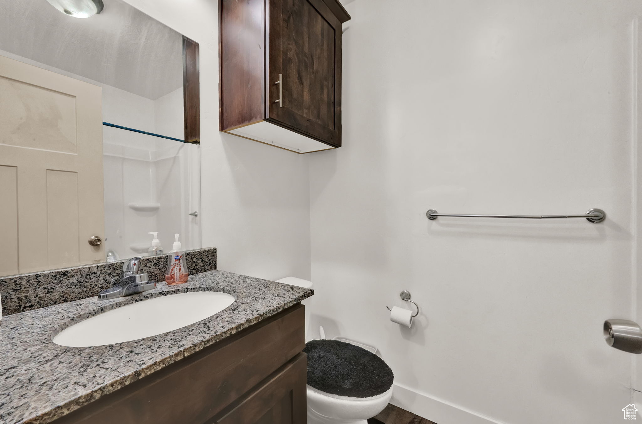 Full Bathroom featuring vanity and toilet