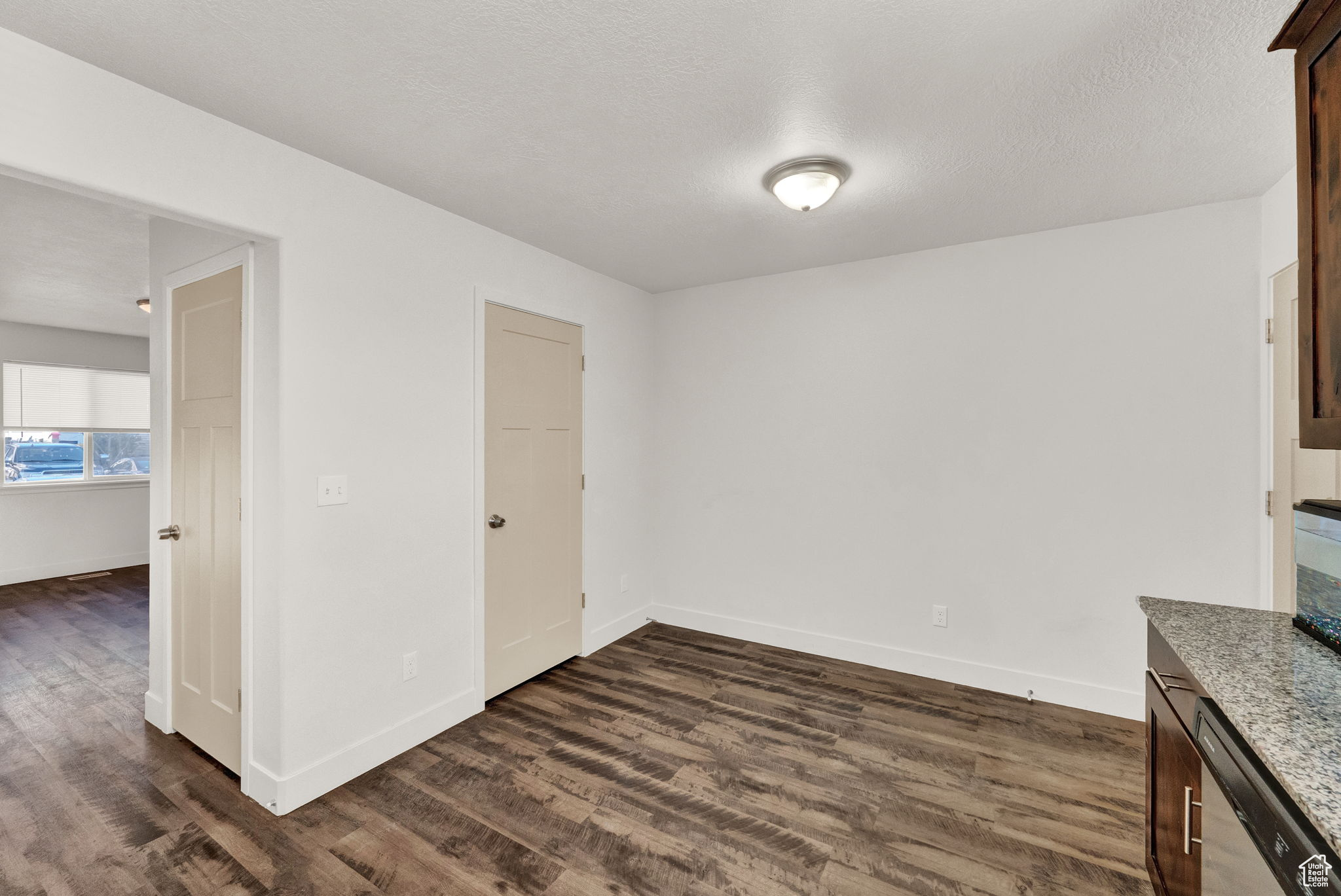 Interior space with dark wood-type flooring