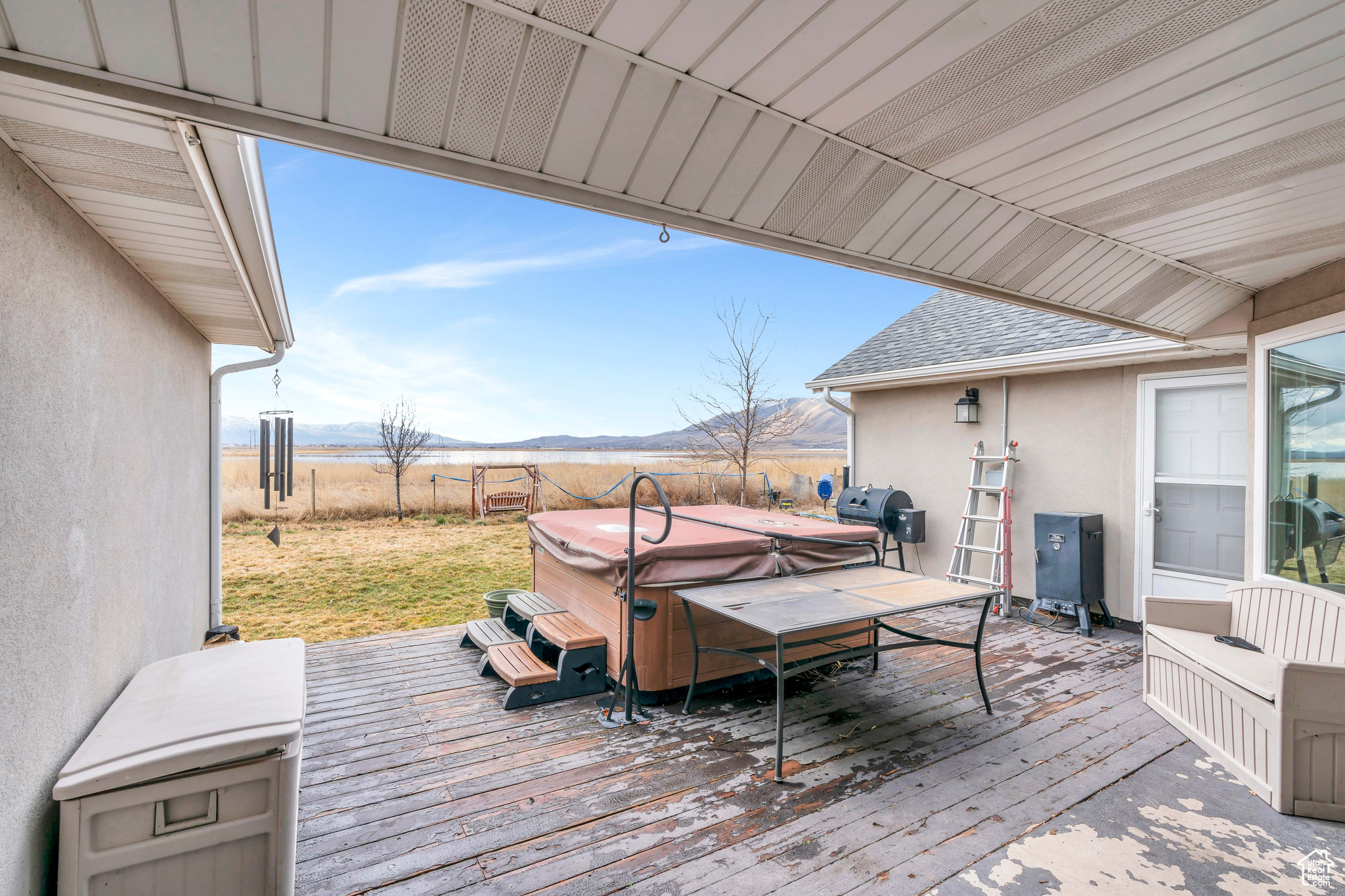 Large Deck with a fantastic view and a HOT TUB!