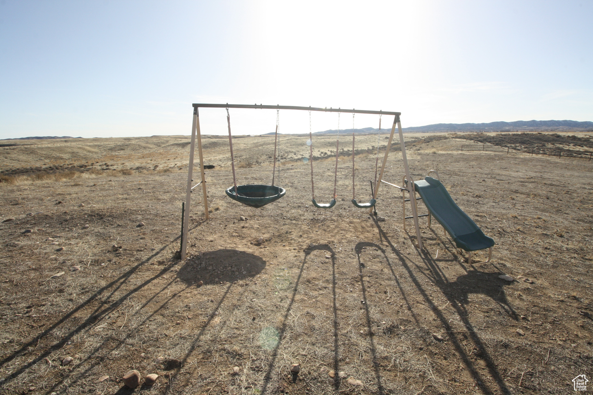 View of playground with a rural view