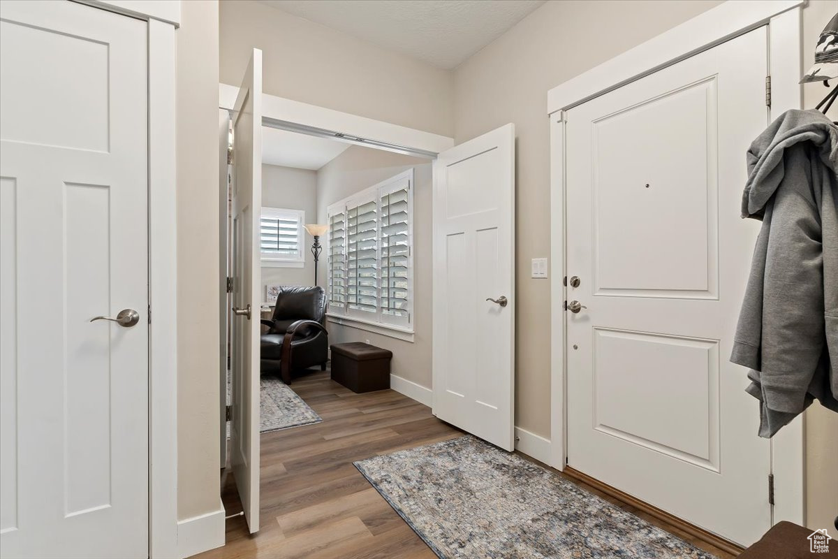 Entryway with light wood-type flooring