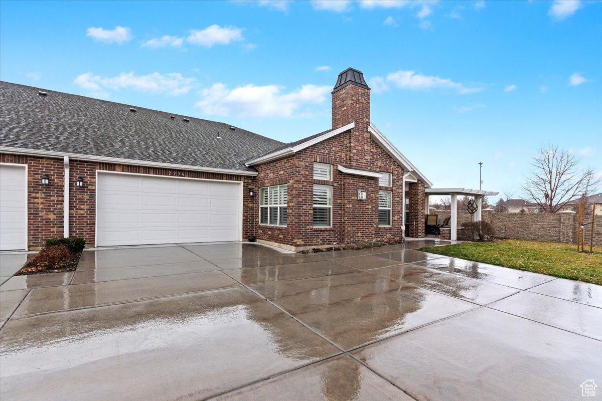 Ranch-style home with a garage