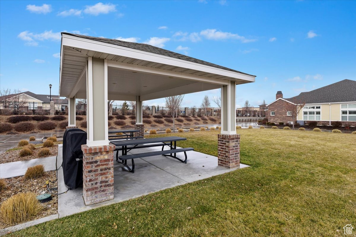 View of nearby features featuring a patio area and a yard