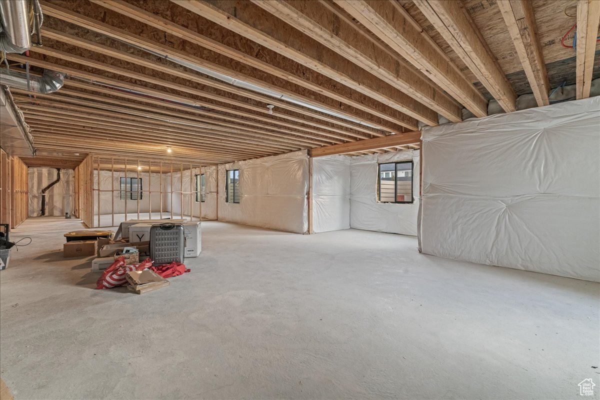 Large Unfinished basement featuring 9' Ceilings and 5' Windows (extra tall)