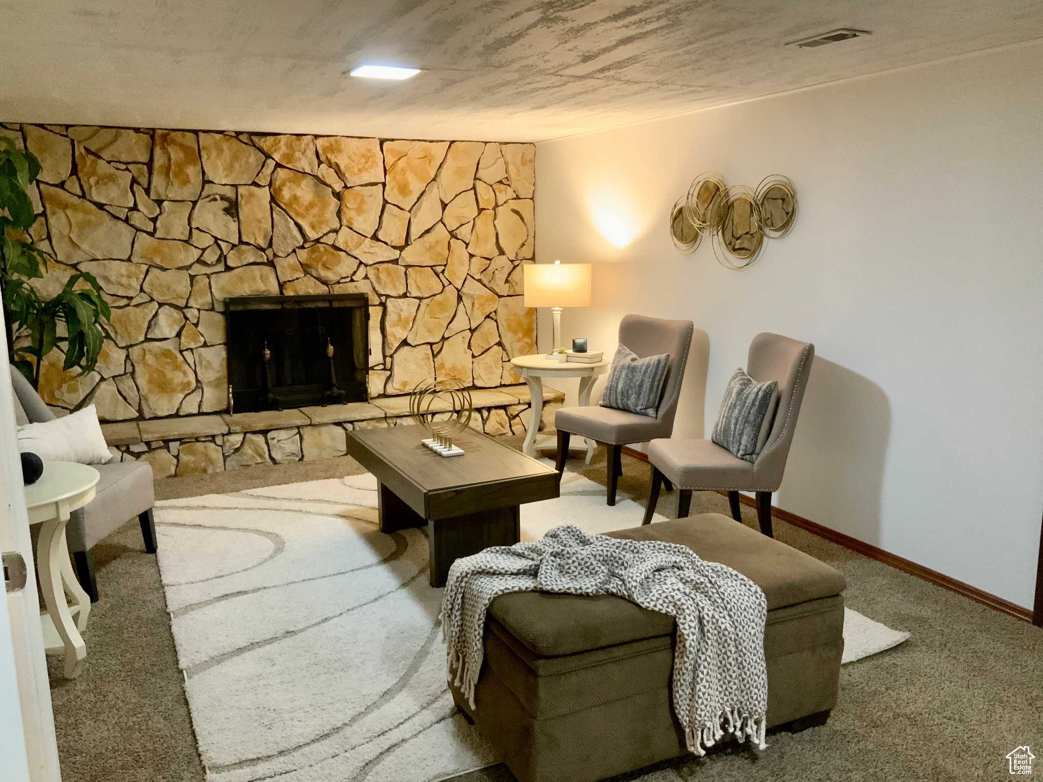Basement family room with real wood burning fireplace