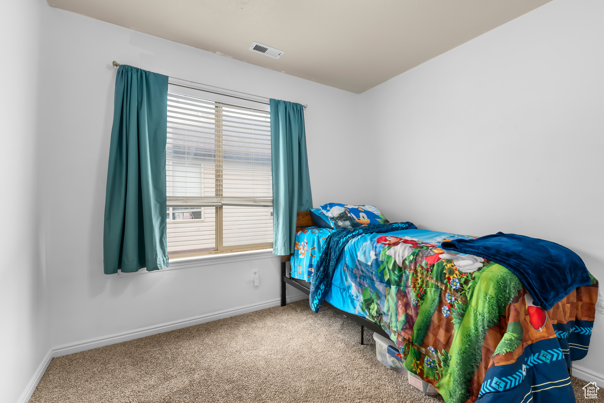 Bedroom with carpet