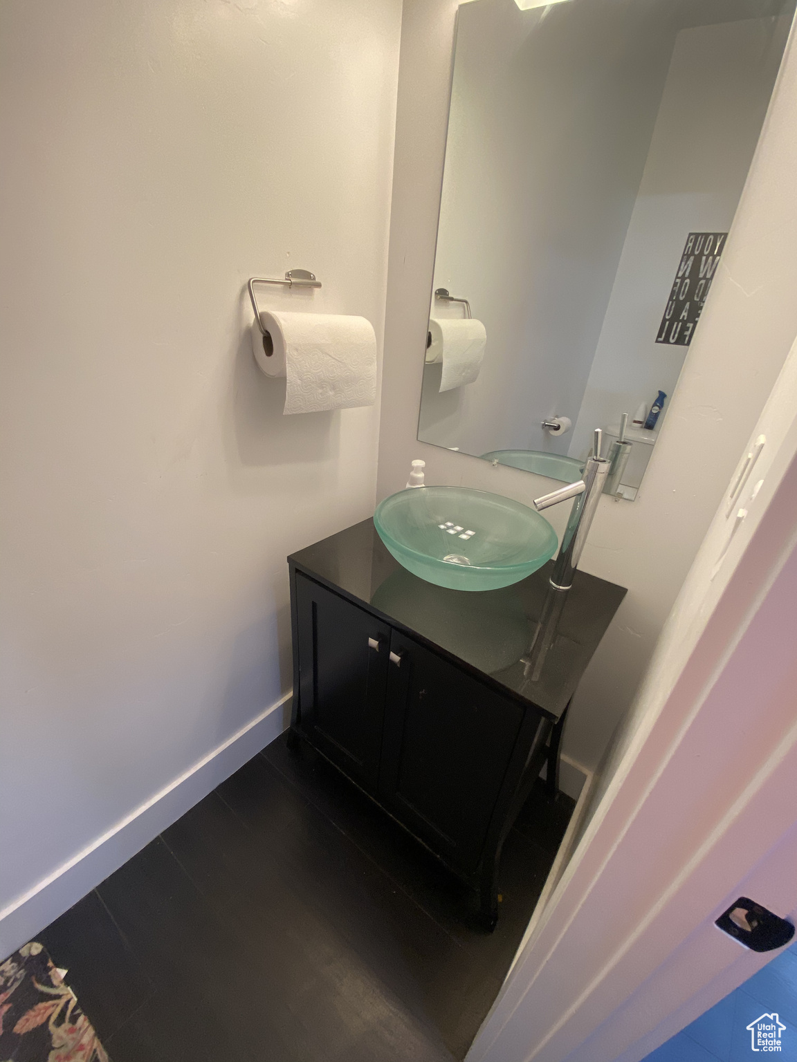 Bathroom featuring hardwood / wood-style floors and vanity
