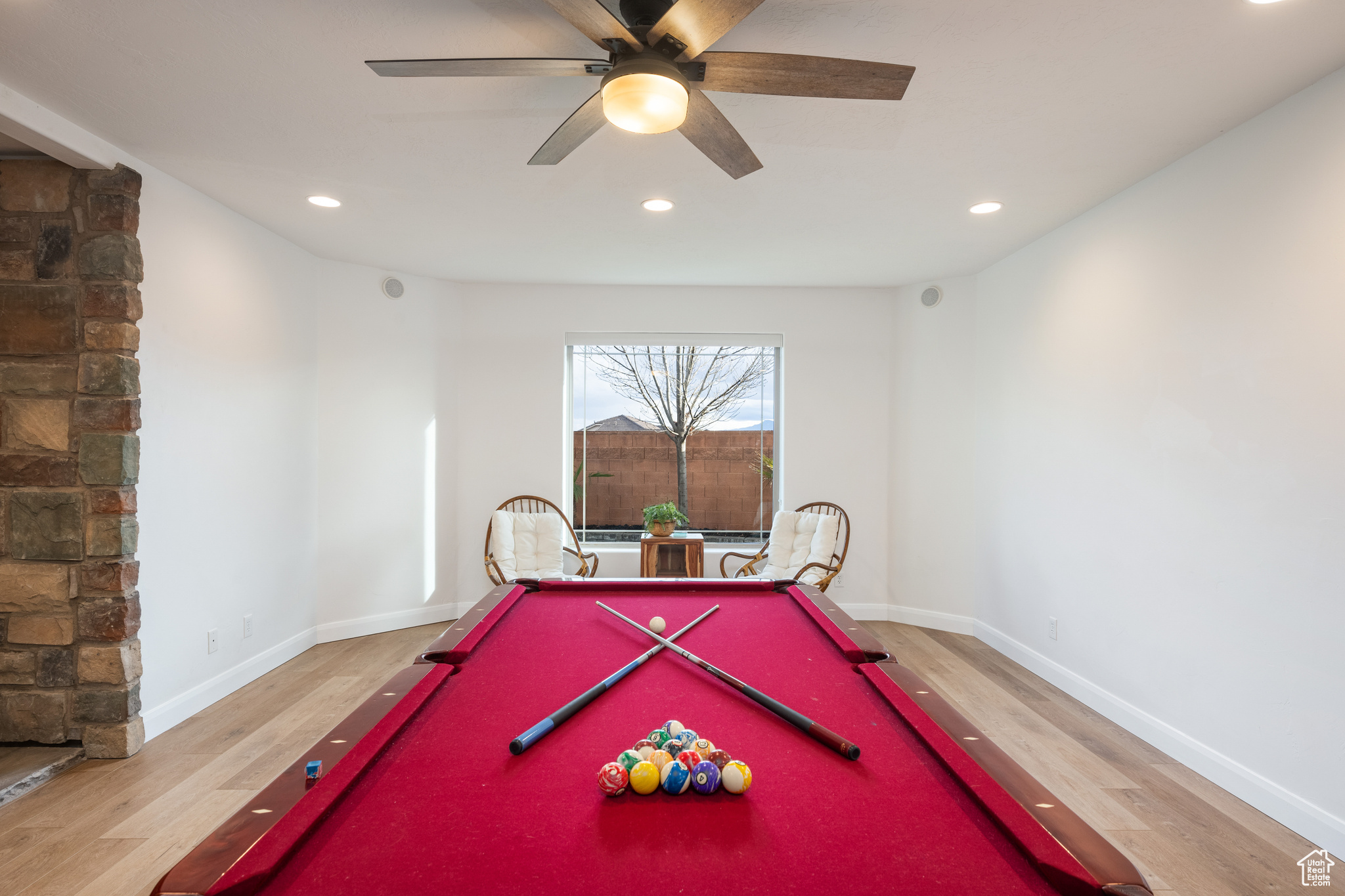 Rec room with light hardwood / wood-style flooring, ceiling fan, and billiards