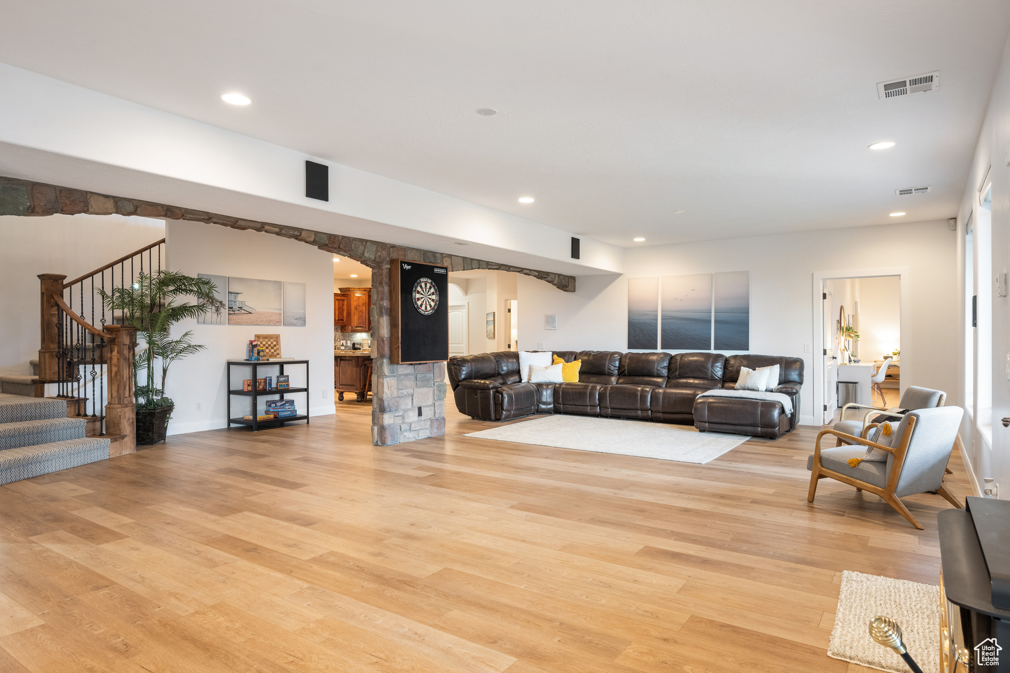 Living room with light wood-type flooring