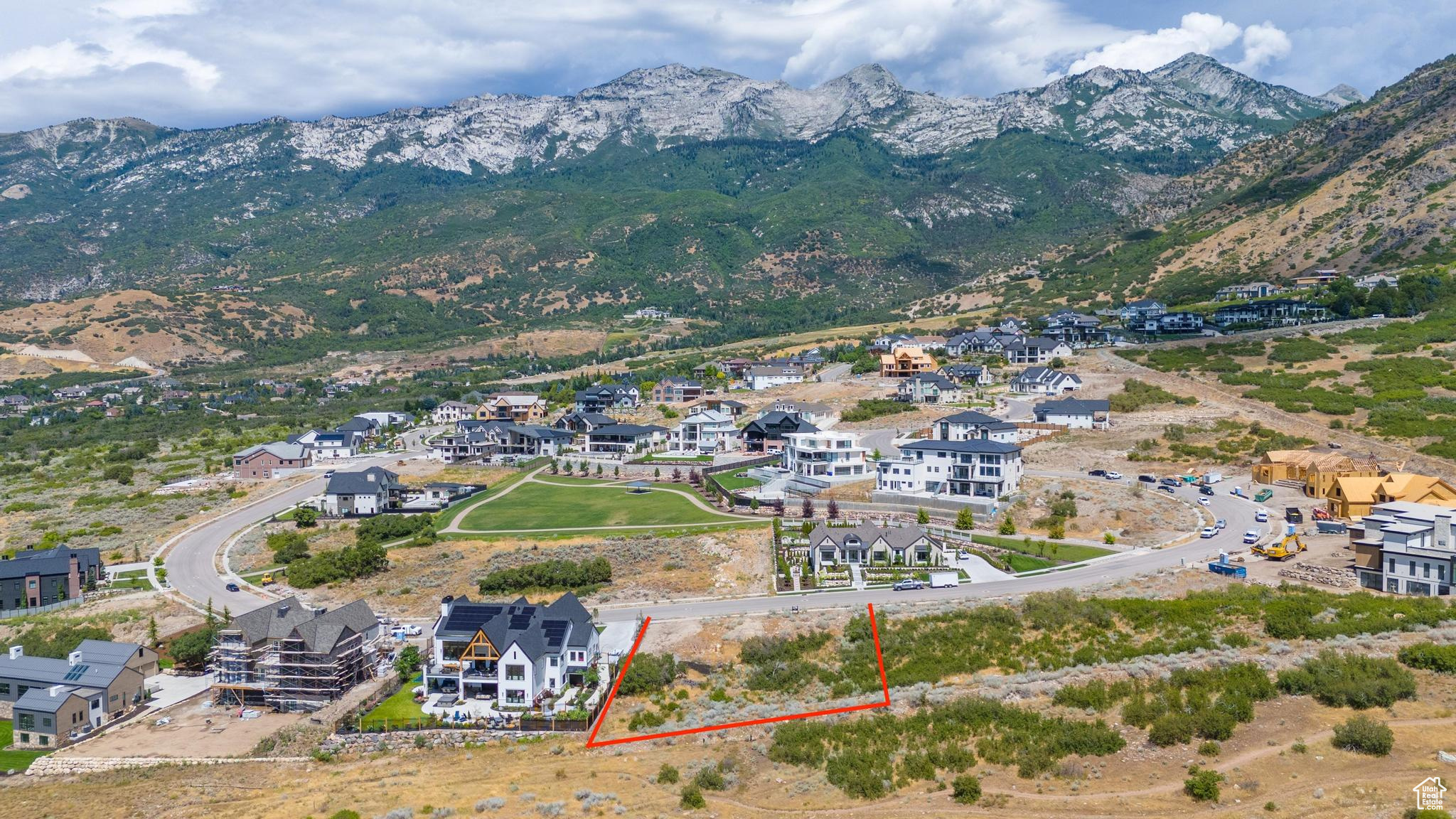 Birds eye view of property with a mountain view