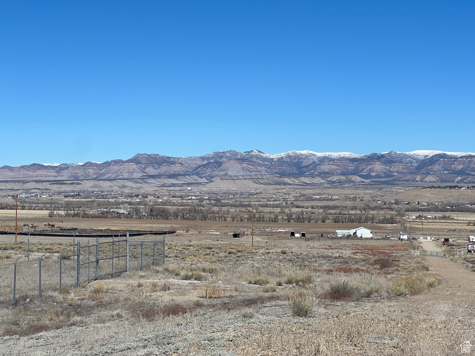 Property is behind the fenced in acreage.