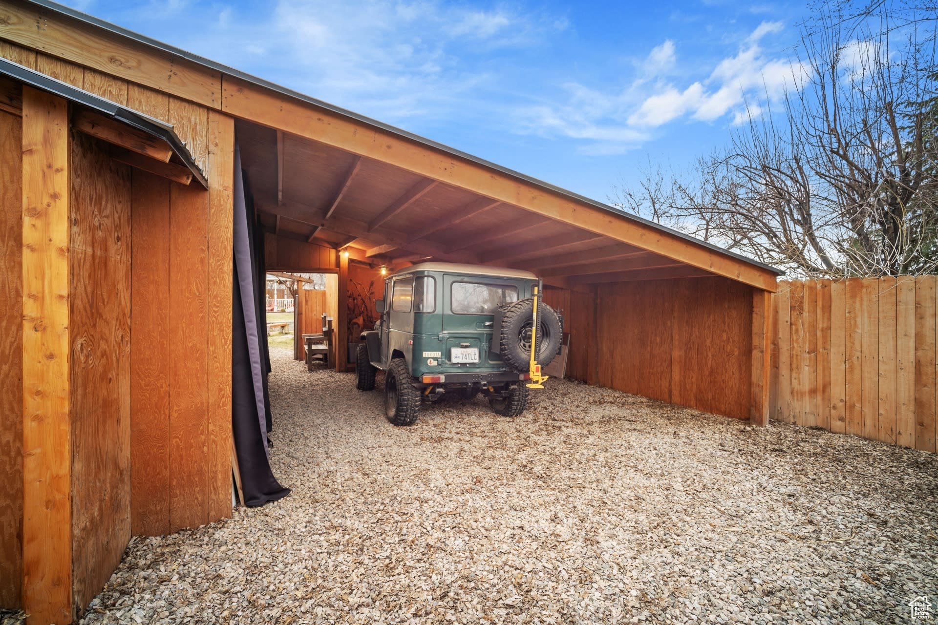 Exterior space with a carport