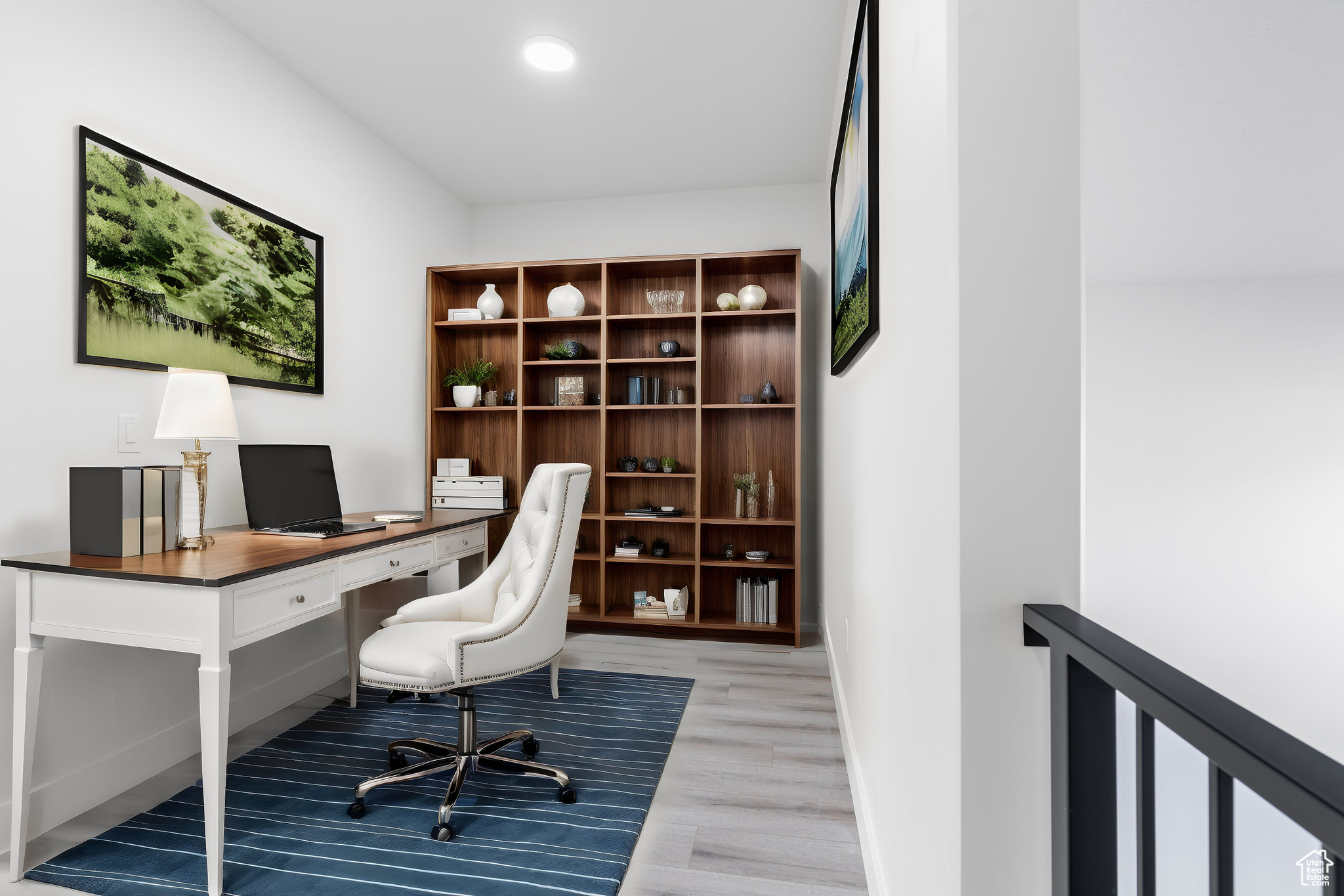 Office area featuring light hardwood / wood-style floors