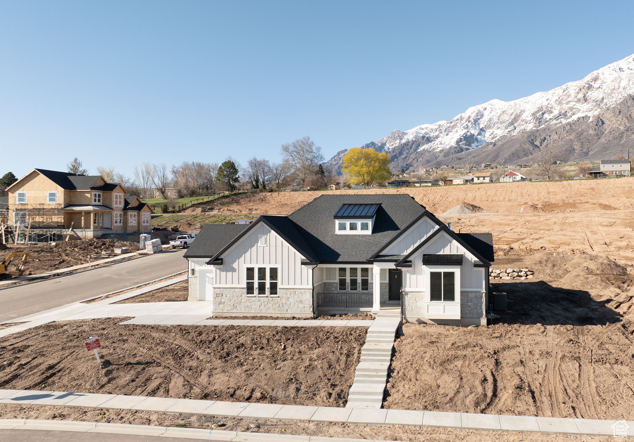 View of front of property with a mountain view