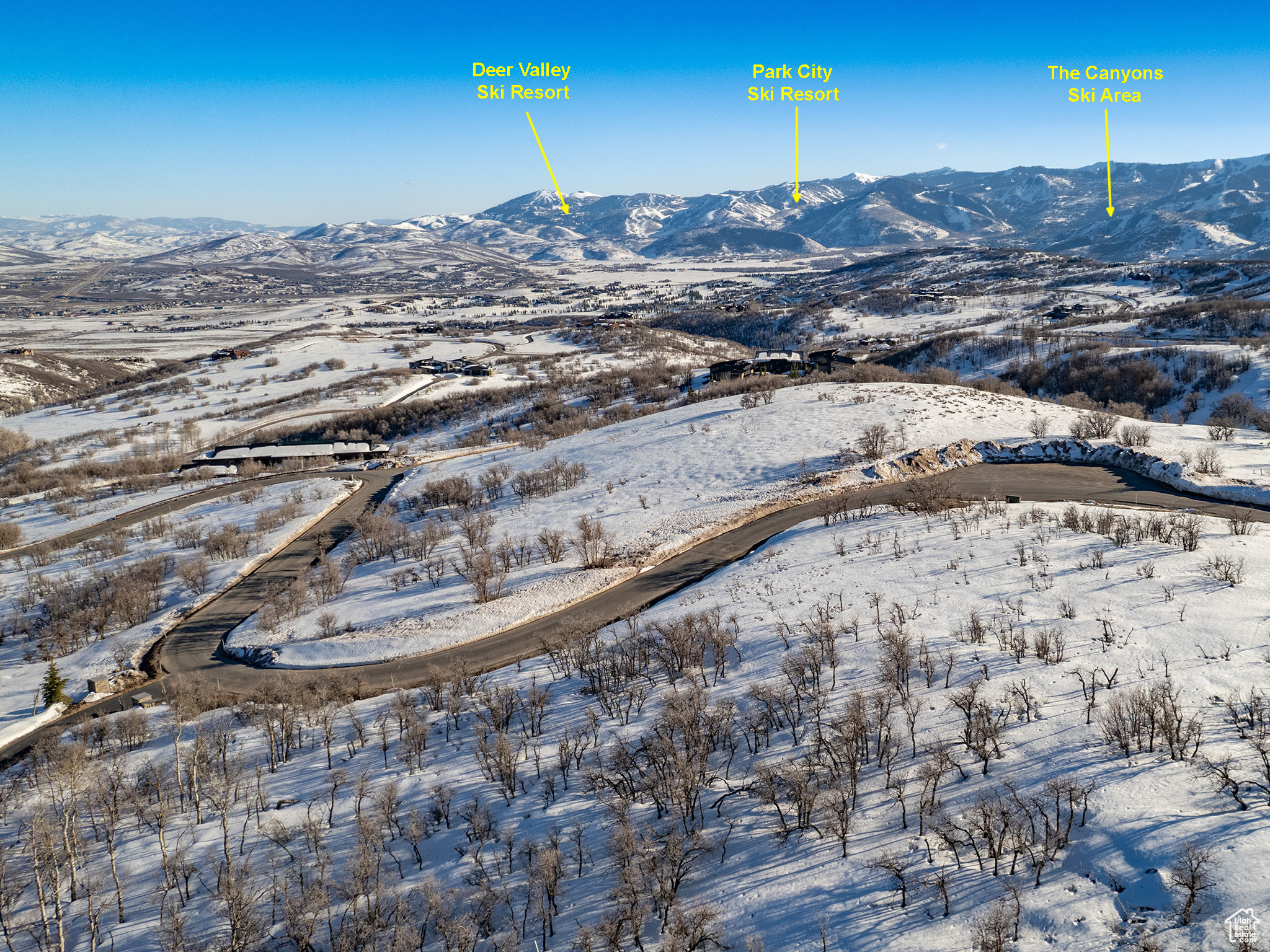 Snowy aerial view with a mountain view