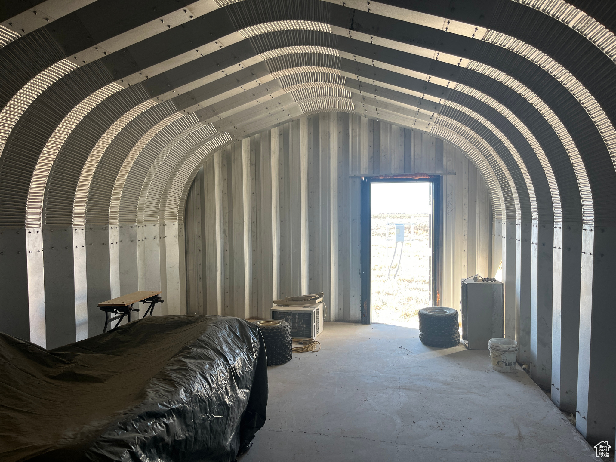 Bedroom featuring vaulted ceiling