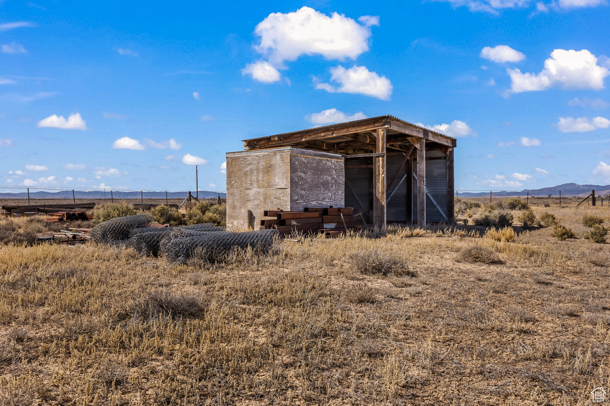 View of shed / structure with a rural view