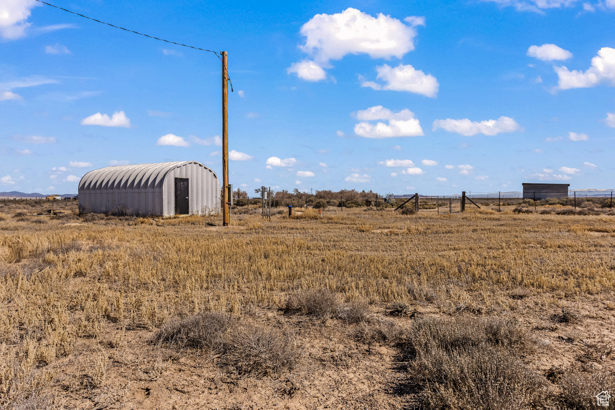 View of yard with a rural view