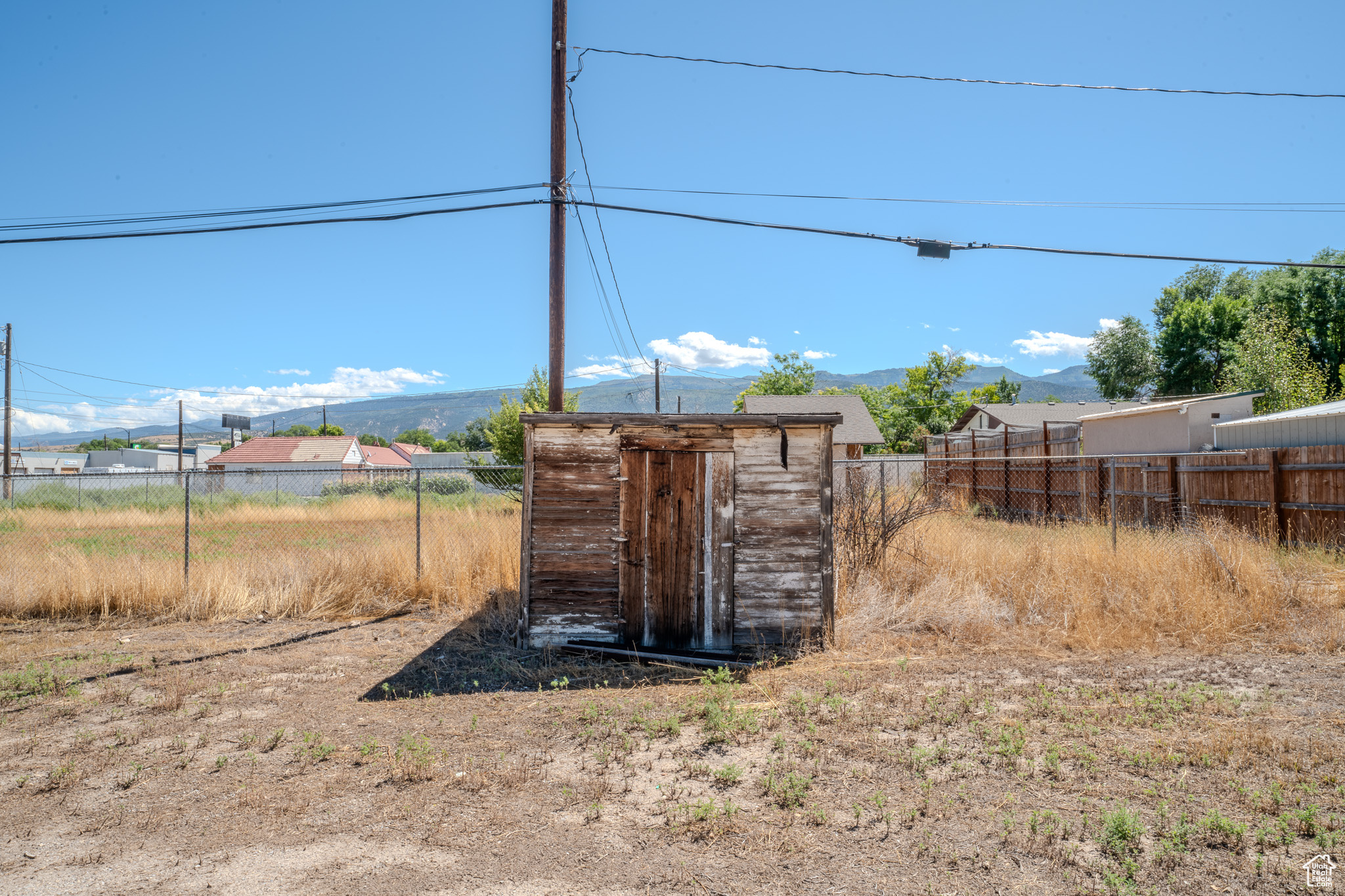 View of outbuilding featuring a mountain view