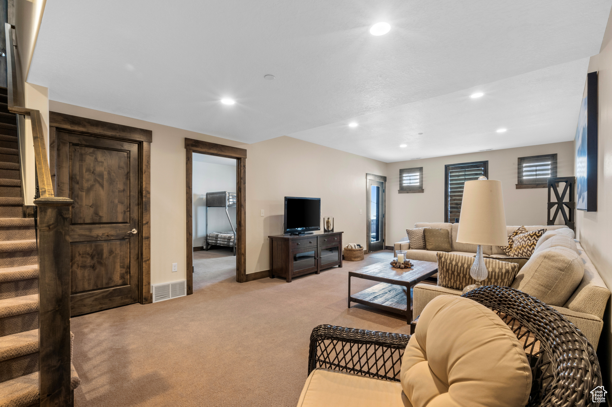 Living room with light carpet