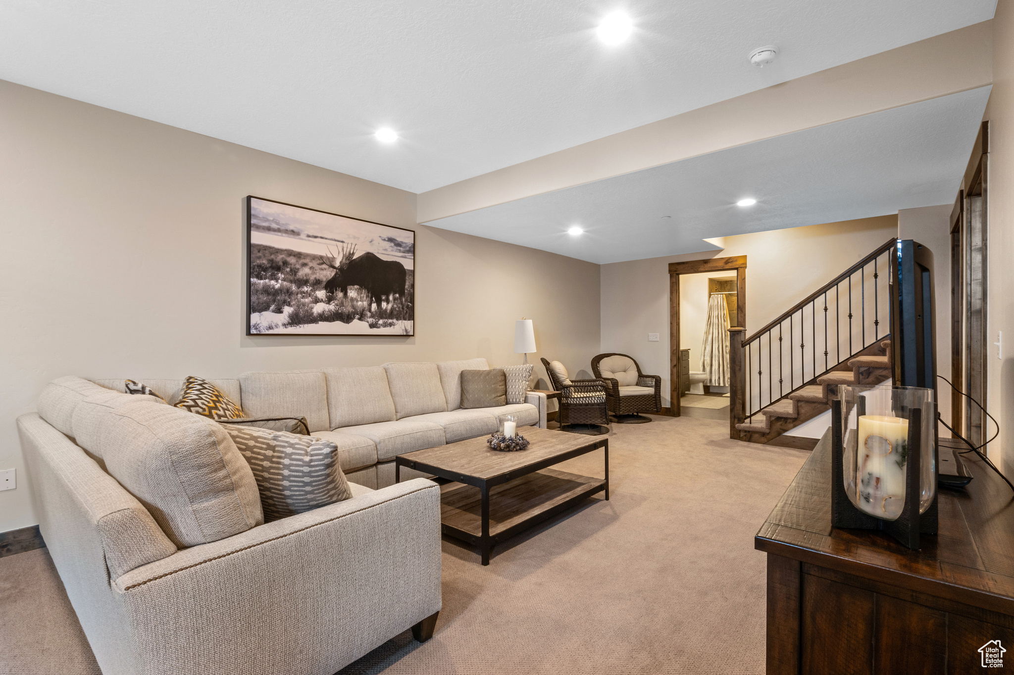 Living room with light colored carpet