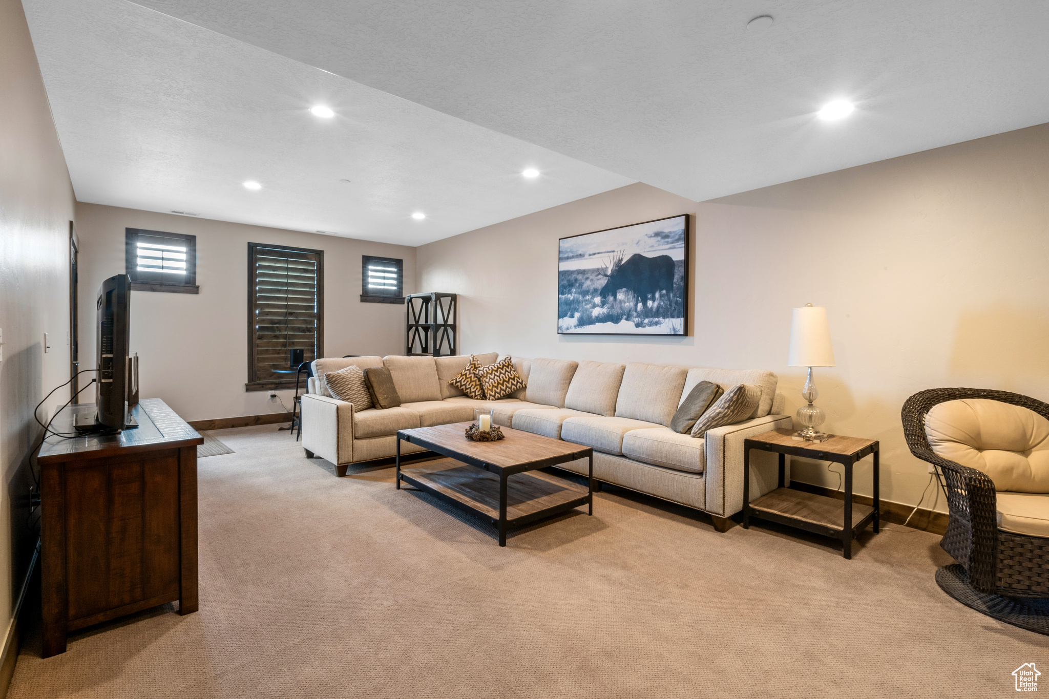 Living room with light colored carpet