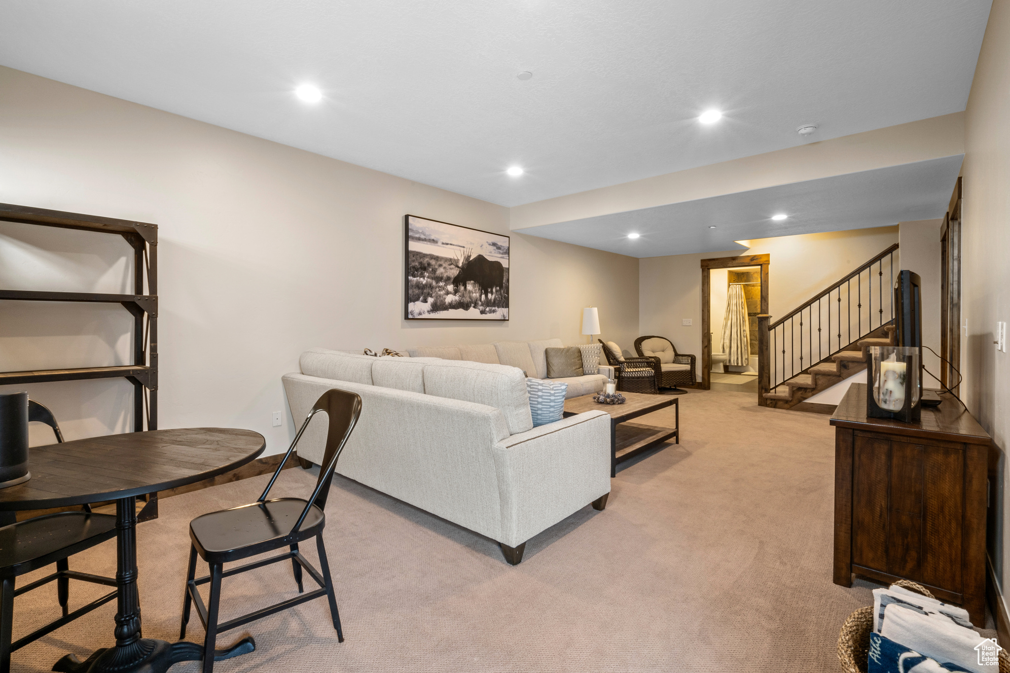 Living room with light colored carpet