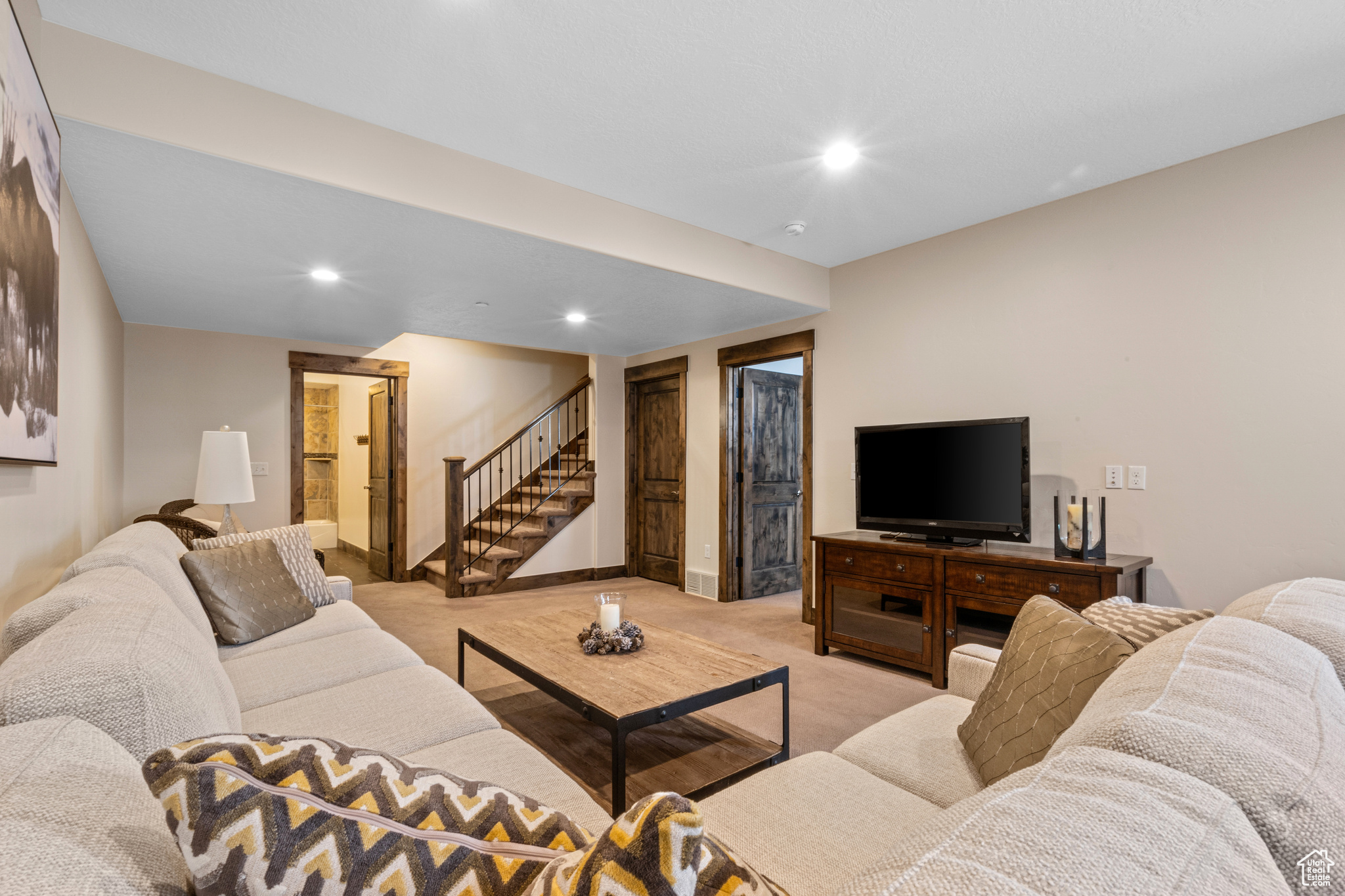 Living room with light colored carpet