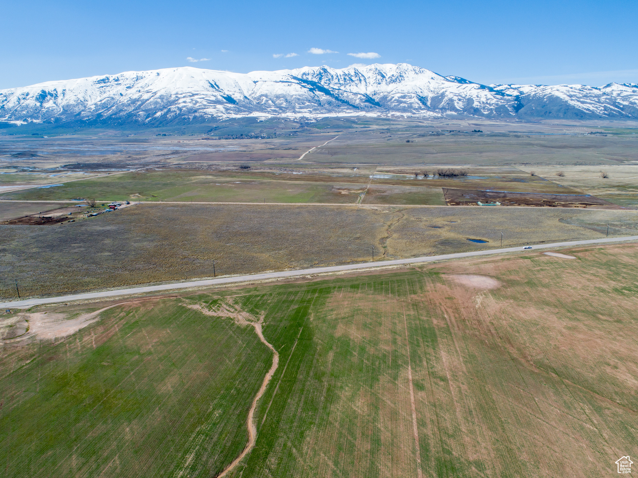 Birds eye view of property featuring a rural view and a mountain view