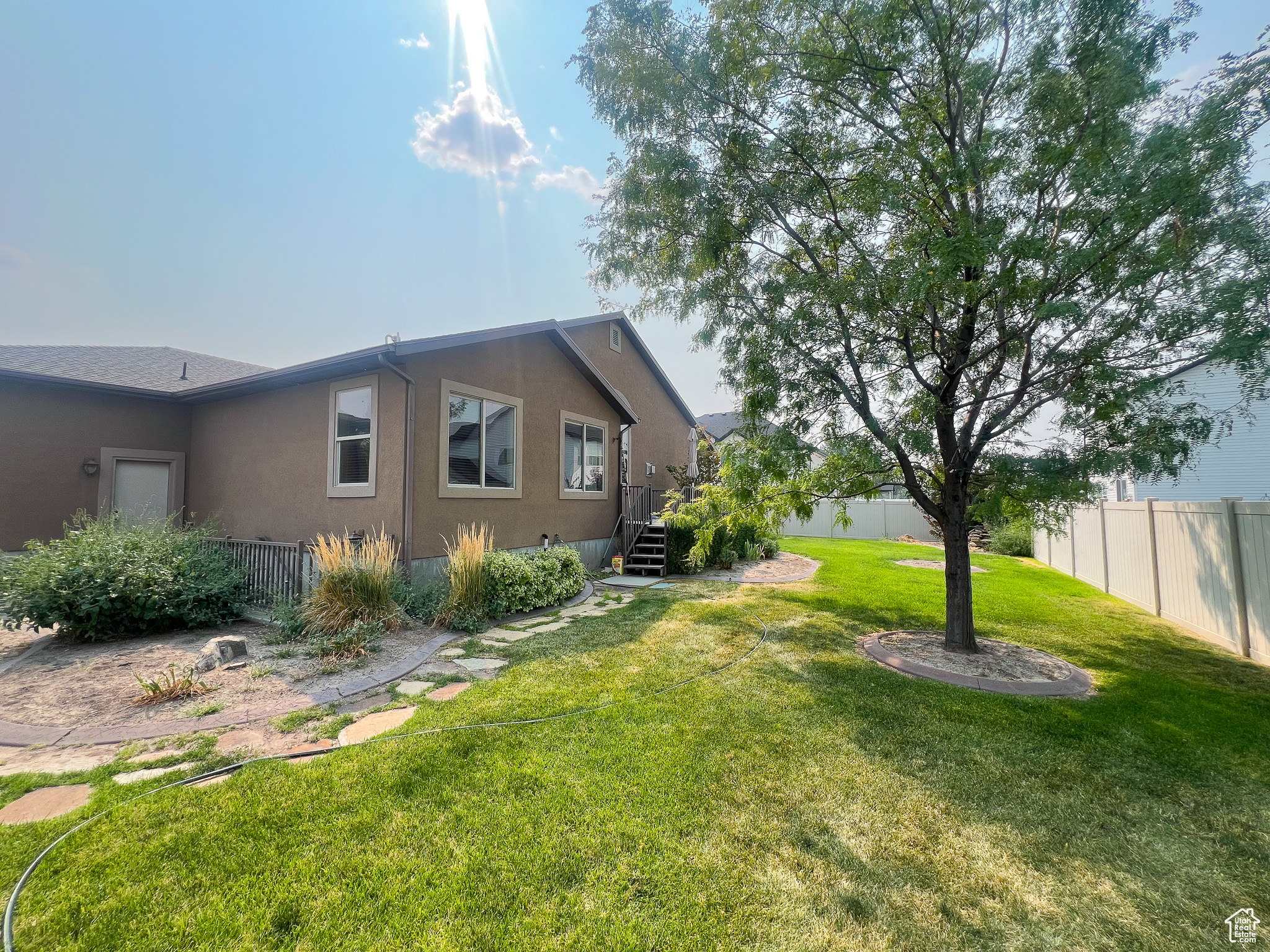 View of home's exterior featuring a yard