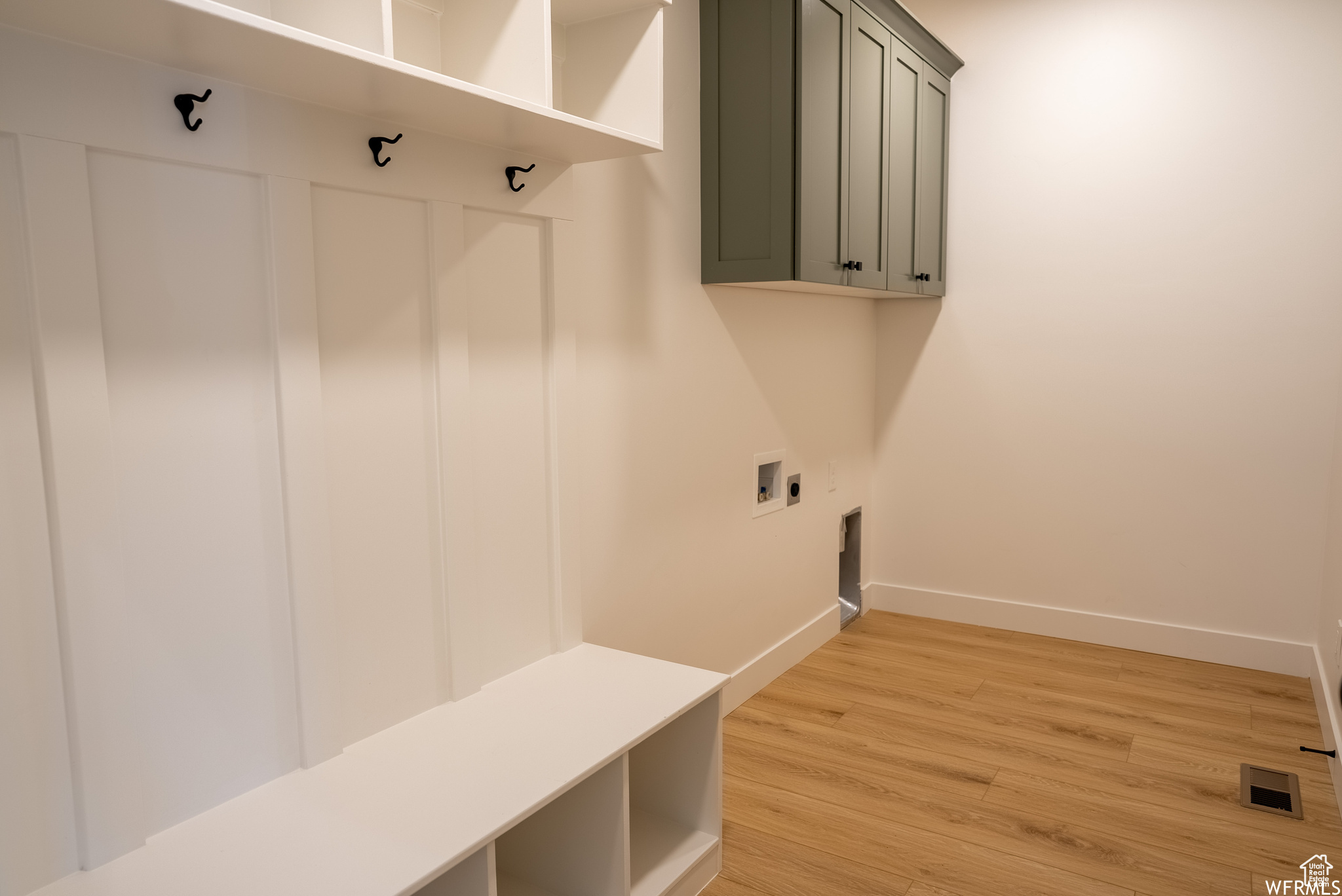 Laundry and mudroom with access to garage