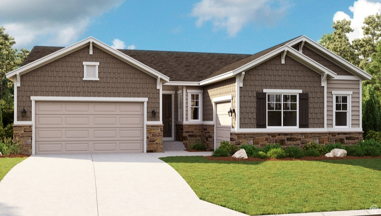 Craftsman-style home featuring a front yard and a garage