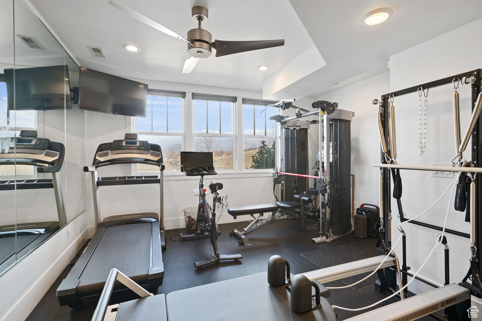 Large workout room with weight equipment, and sauna