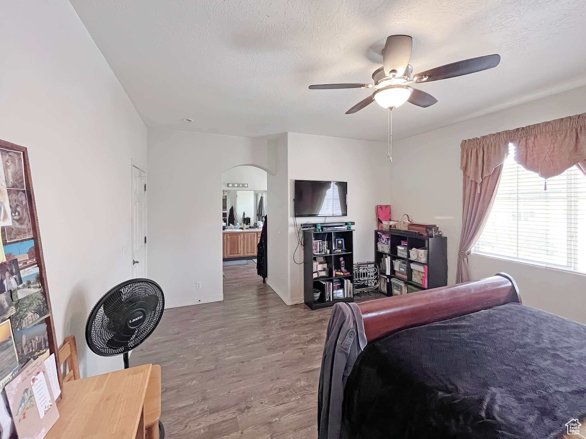 Master Bedroom featuring a private, full bathroom and large walk-in closet