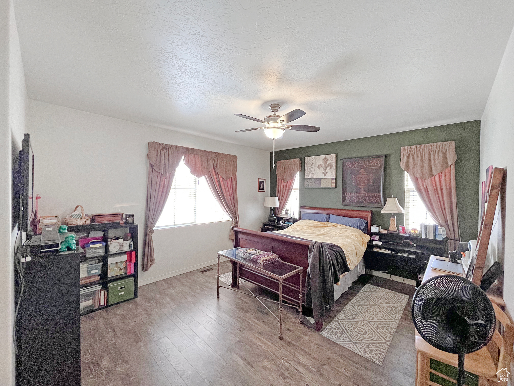 Master Bedroom featuring beautiful flooring, great views, and ceiling fan