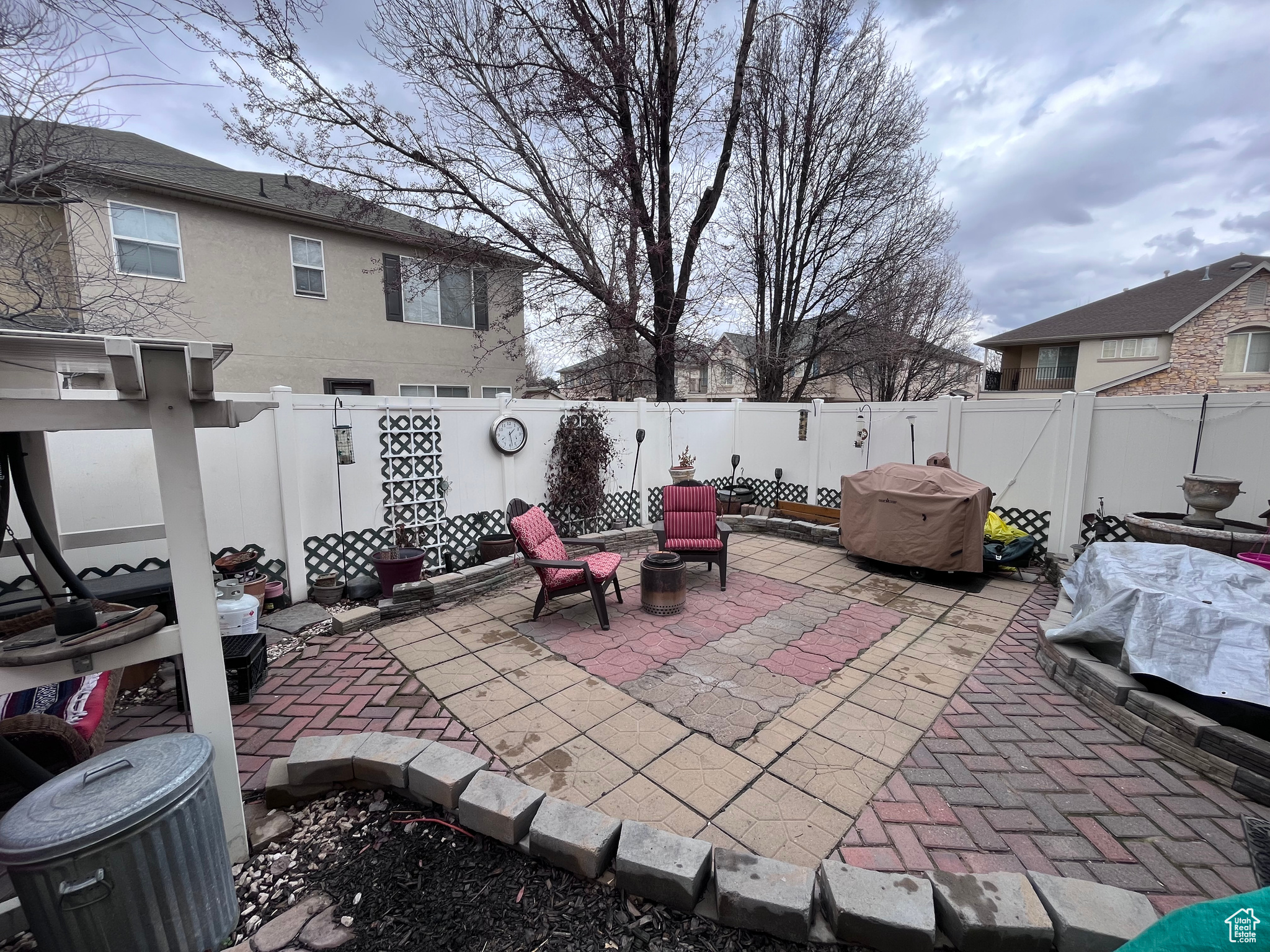 Private backyard featuring maintenance-free upkeep