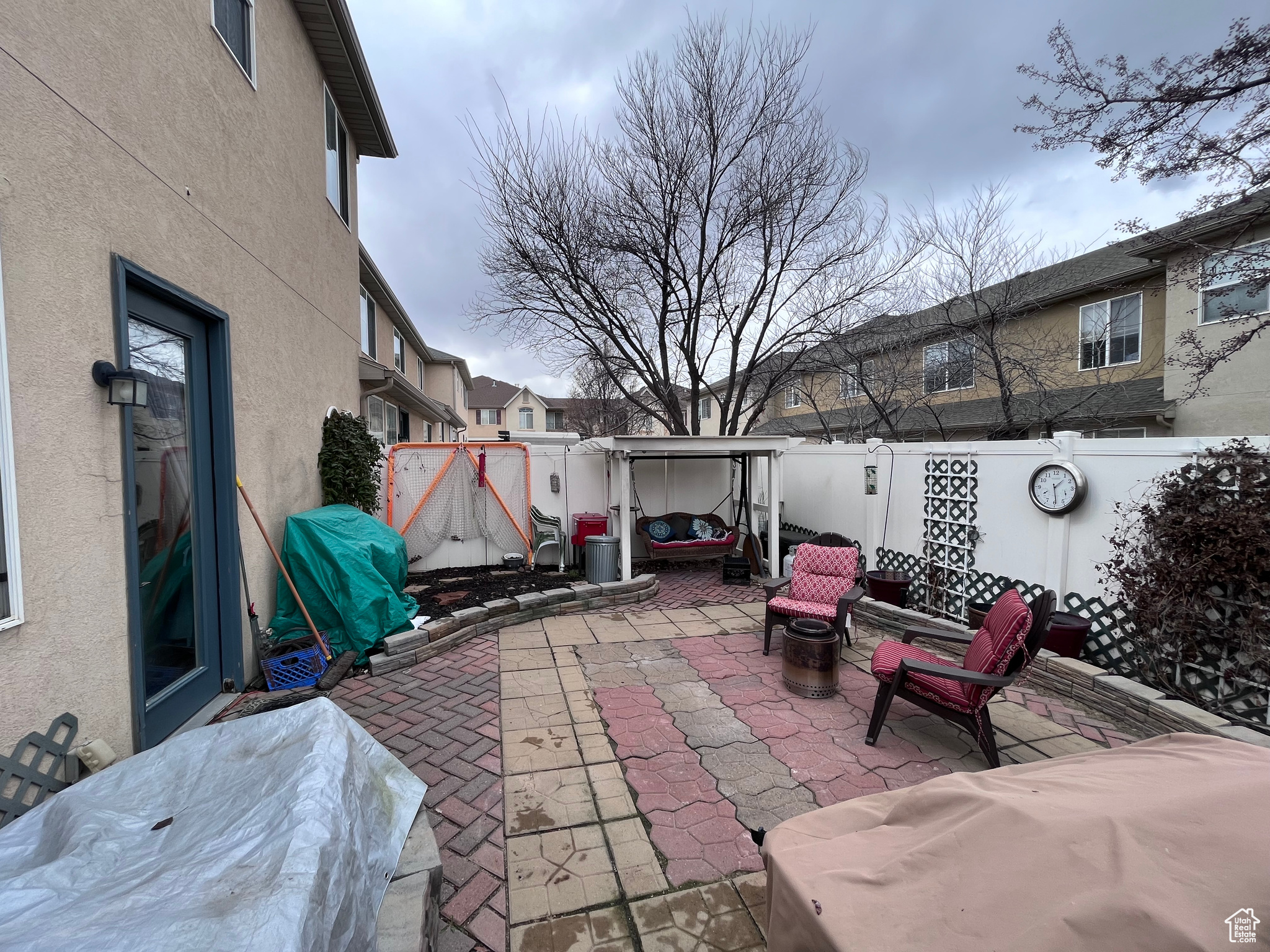 Private backyard featuring maintenance-free upkeep