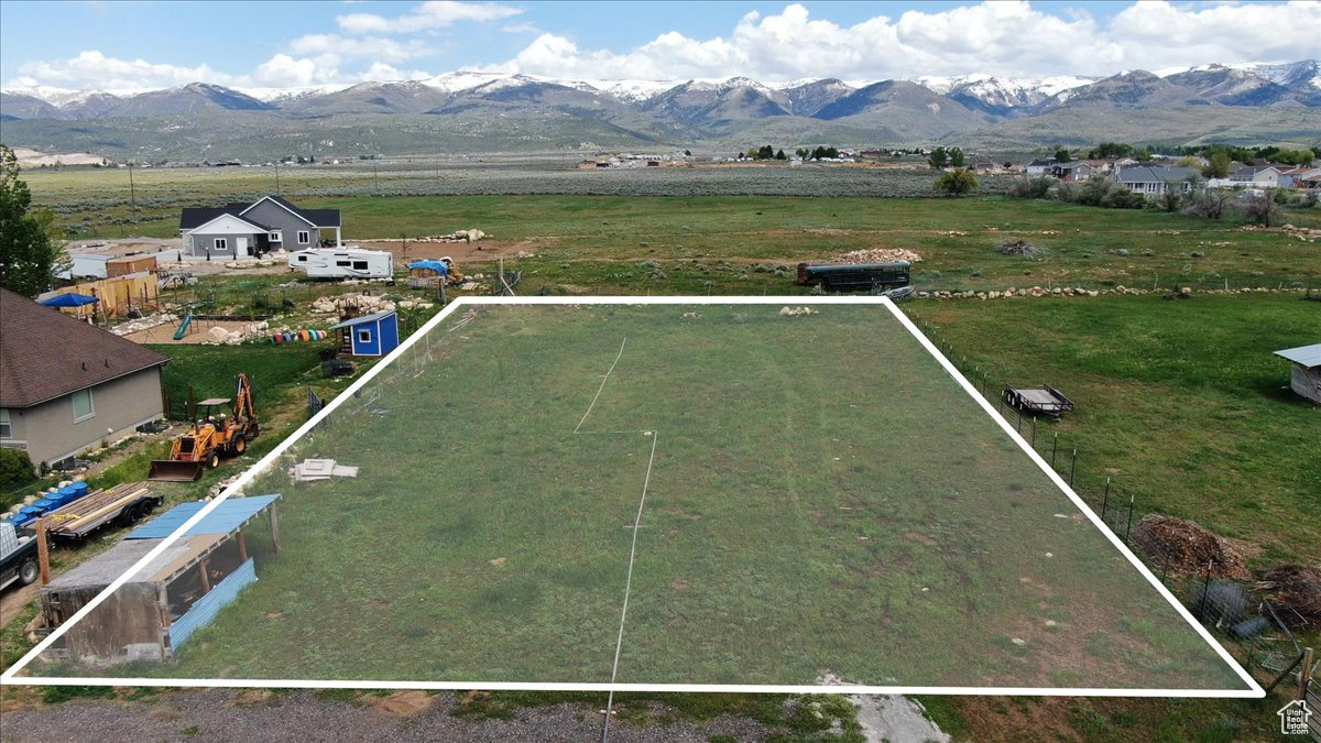 Drone / aerial view featuring a rural view and a mountain view