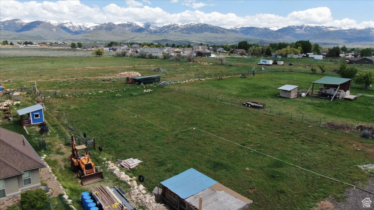 Drone / aerial view featuring a mountain view and a rural view