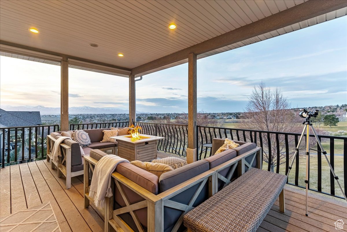 Deck with an outdoor hangout area