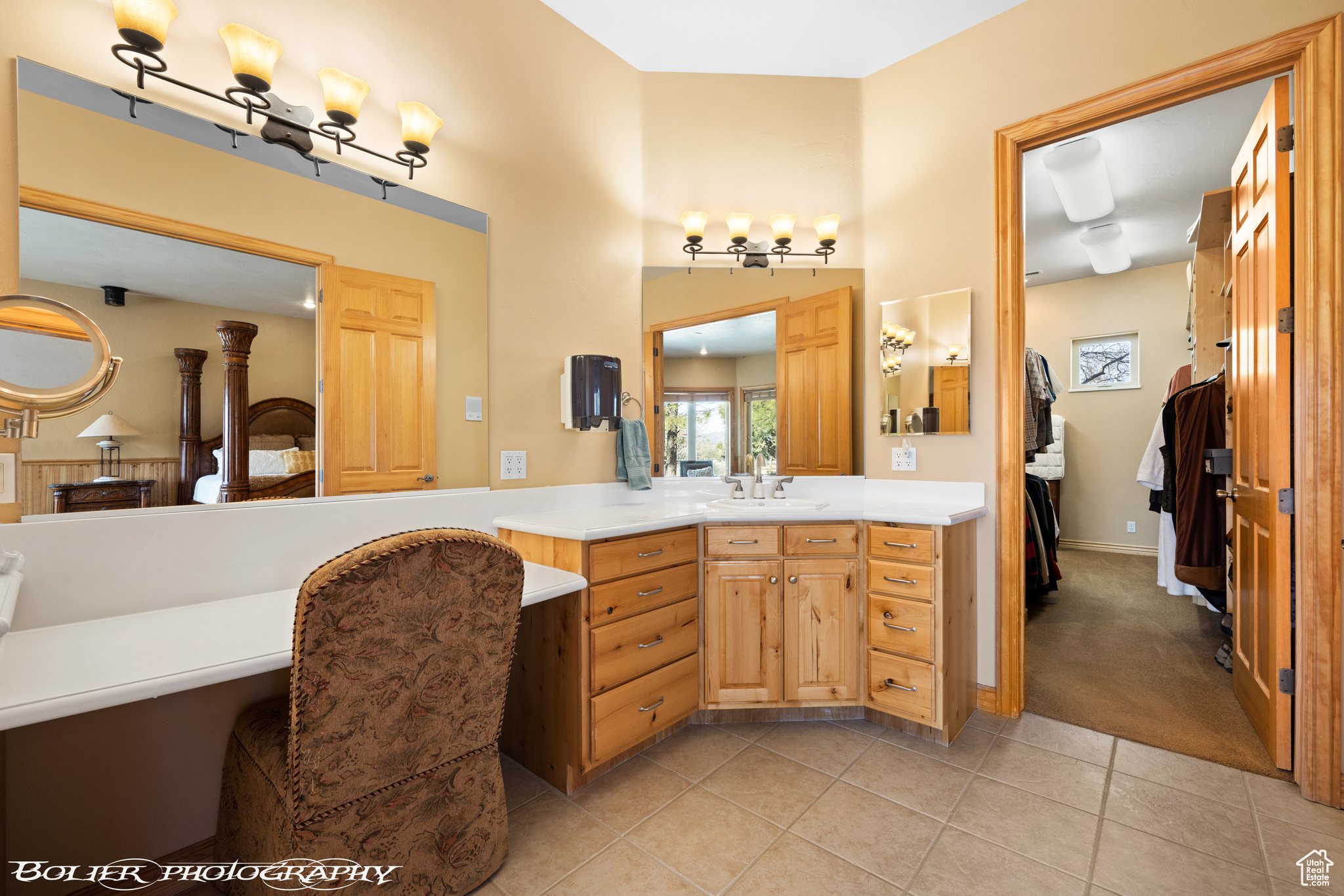 Bathroom featuring tile flooring and vanity