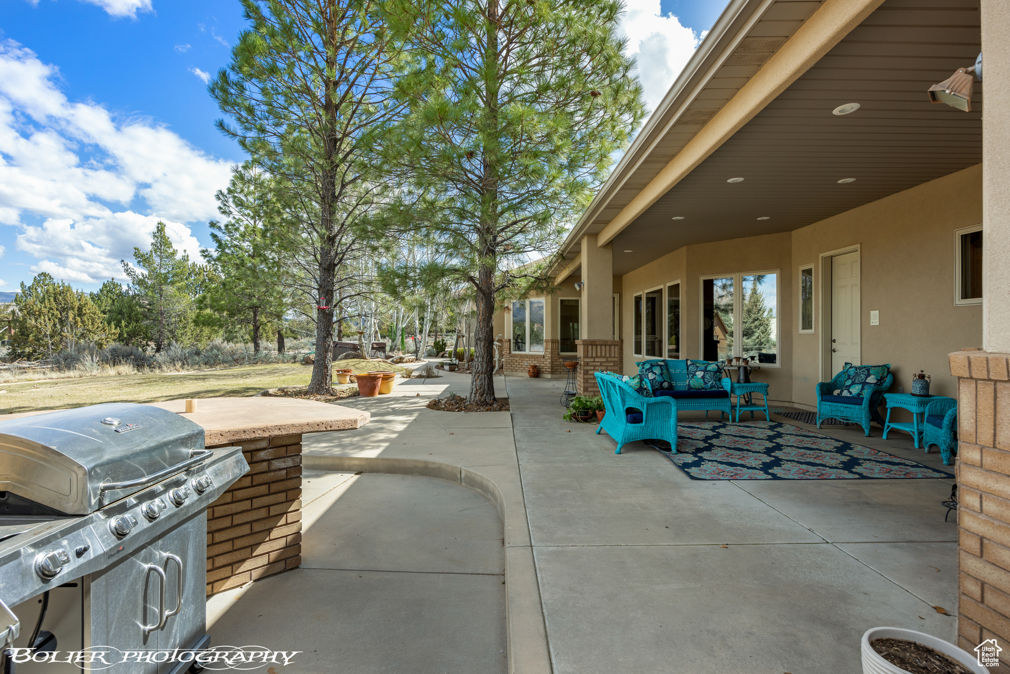 View of terrace with a grill and an outdoor hangout area