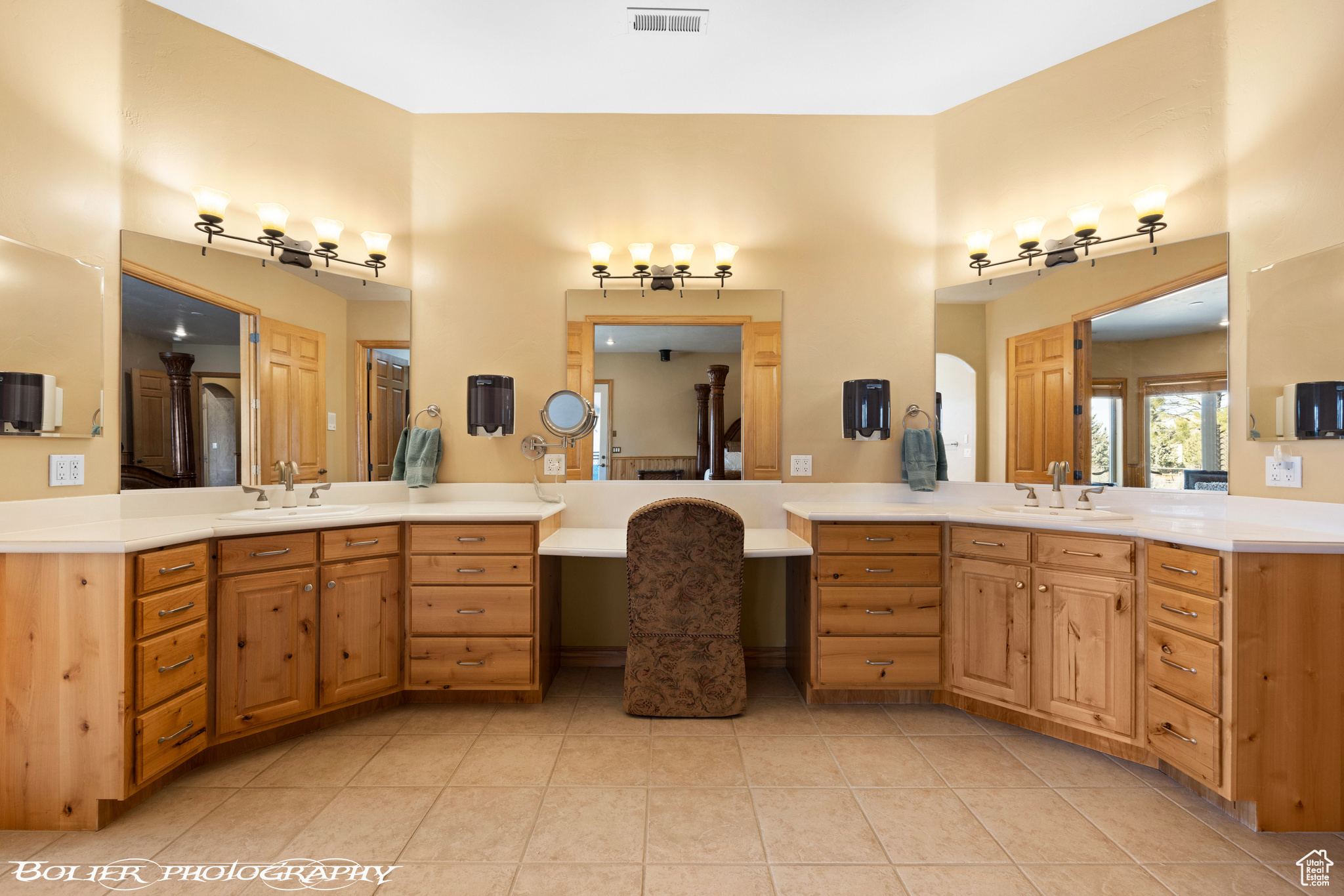 Bathroom with tile floors, double sink, and oversized vanity