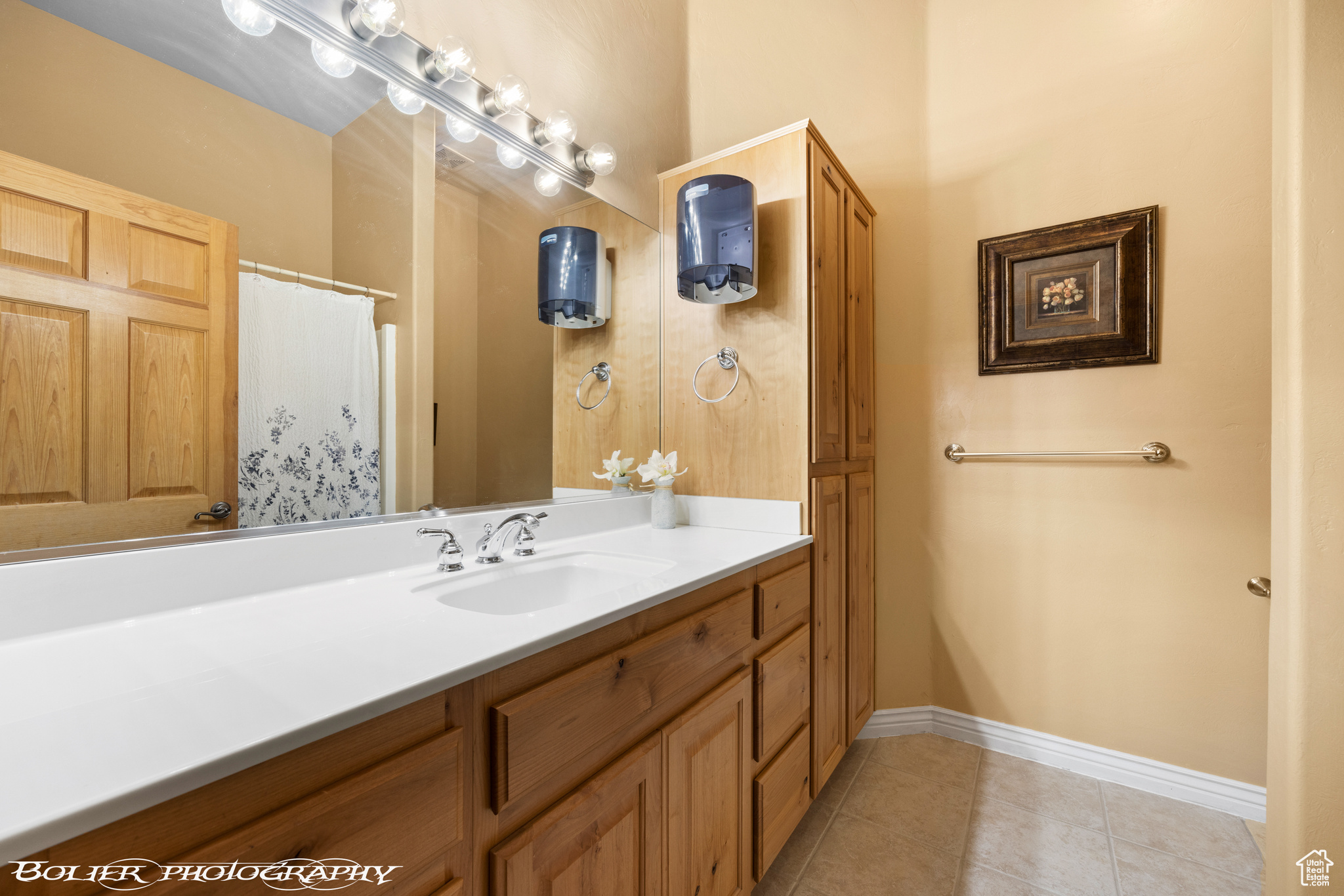 Bathroom with vanity and tile flooring